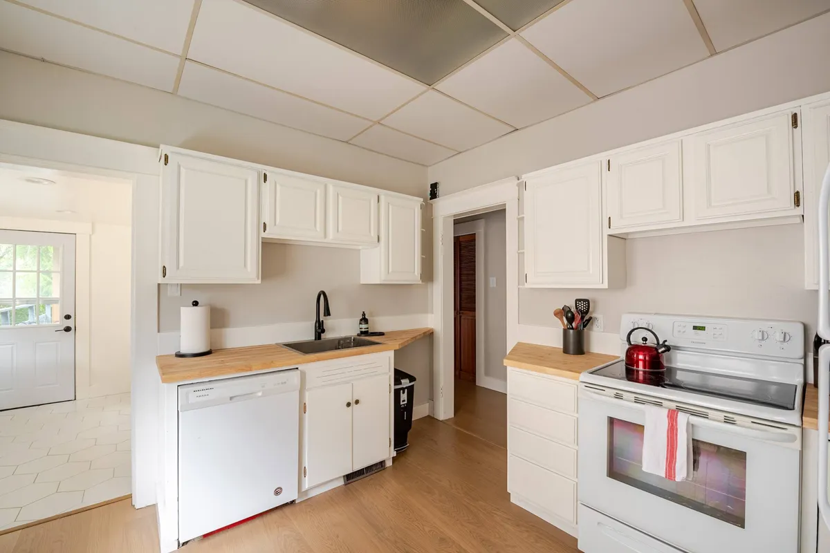 Fully stocked kitchen with butcher block counters